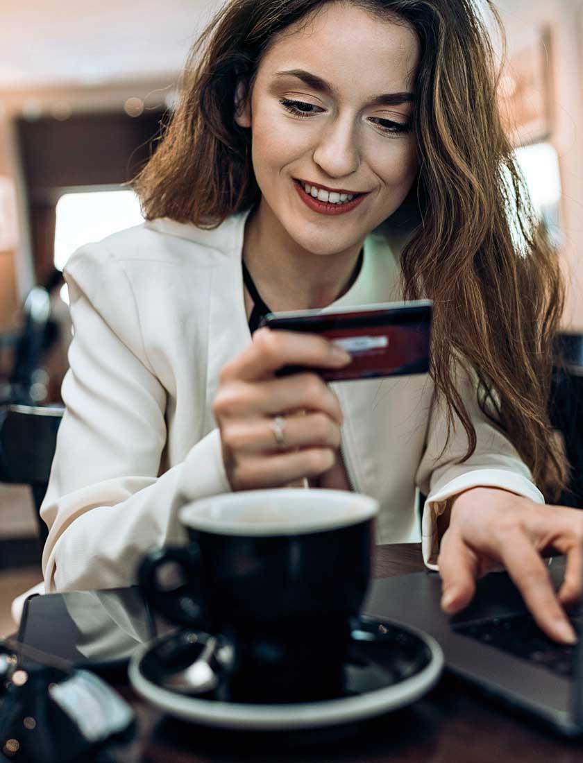 small business owner using a business rewards credit card